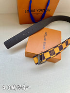Louis Vuitton belt with smooth dark strap end and Damier check section with gold buckle
