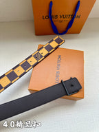 Checkered leather belt with metal buckle, plus matching black strap piece