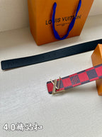 Checked belt with red-and-navy pattern; silver-tone buckle centered on strap