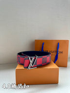 Checked belt with red and dark navy grid, secured with metal V buckle