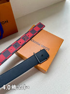 Red and navy check belt with dark blue keeper and black buckle