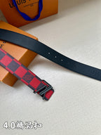 Dark blue leather belt with red/navy check strap, black buckle holes