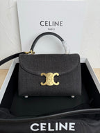 Gray textured Celine handbag with top handle, gold clasp and flap front.