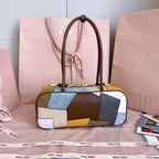 MiuMiu patchwork leather handbag with top handles and front zipper, multicolor paneling
