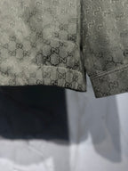 Gucci-pattern jacket hem and cuff detail with dark trim