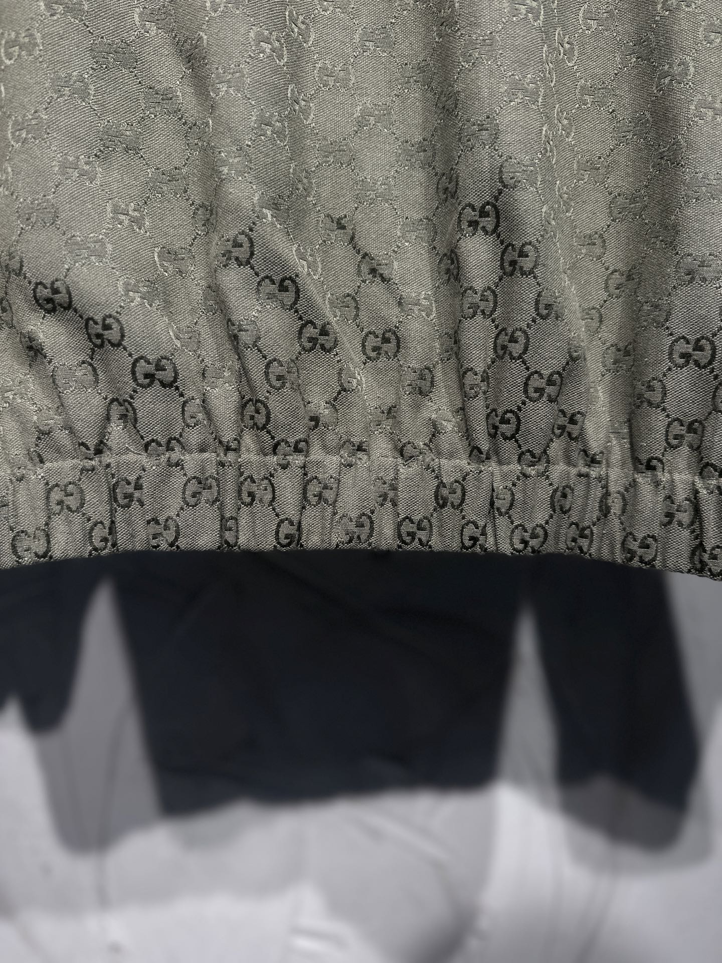 Gucci long garment with GG monogram fabric, dark trim panels