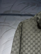 Gucci-pattern jacket sleeve and shoulder view