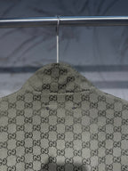 Gucci-pattern hooded jacket top view with allover GG print