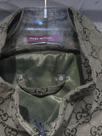 Gucci-pattern jacket inner lining and front pocket detail