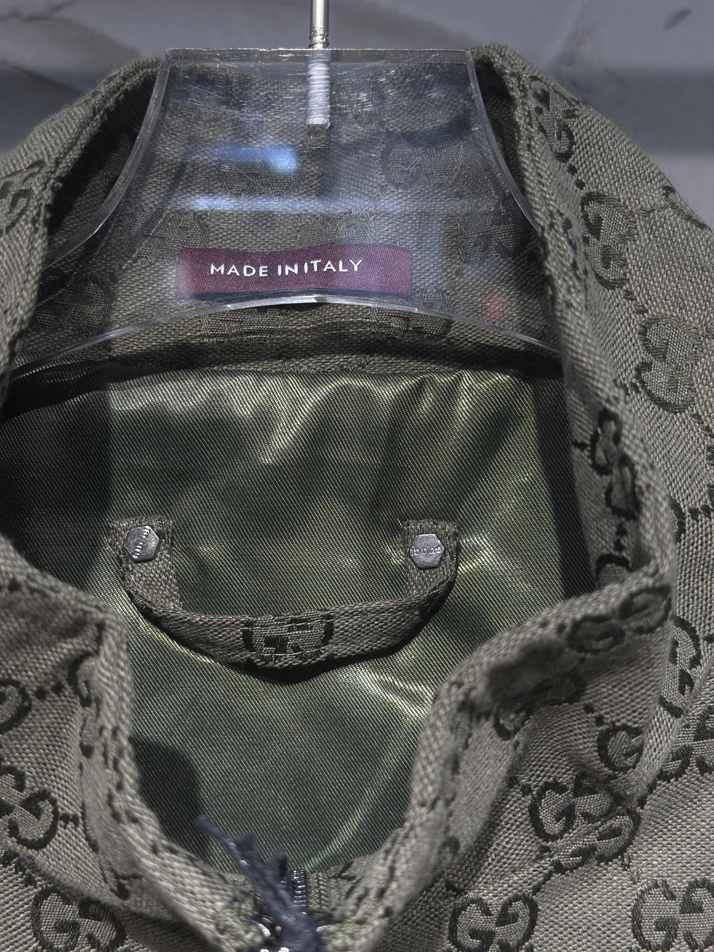 Gucci-pattern jacket inner lining and front pocket detail