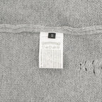 Heather gray knit sweater size label marked “S”