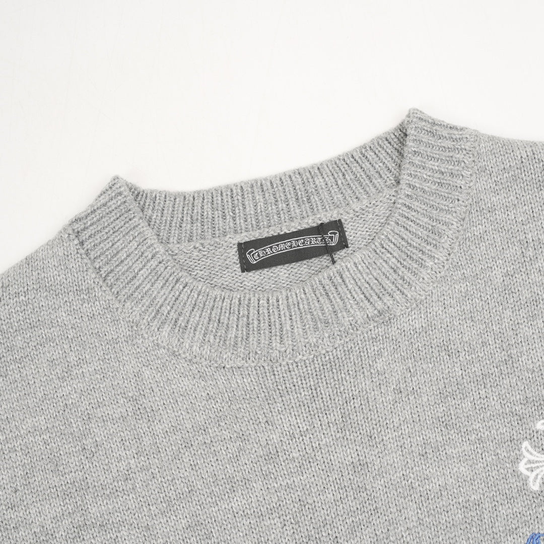 Heather gray knit sweater neckline with small brand label