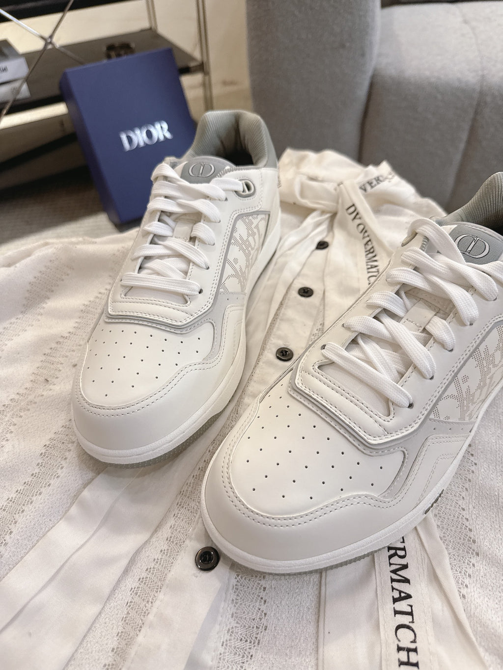 Dior unisex low-top sneakers, white leather with textured paneling and lace-ups