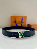 Louis Vuitton belt in dark blue embossed leather with large silver LV buckle