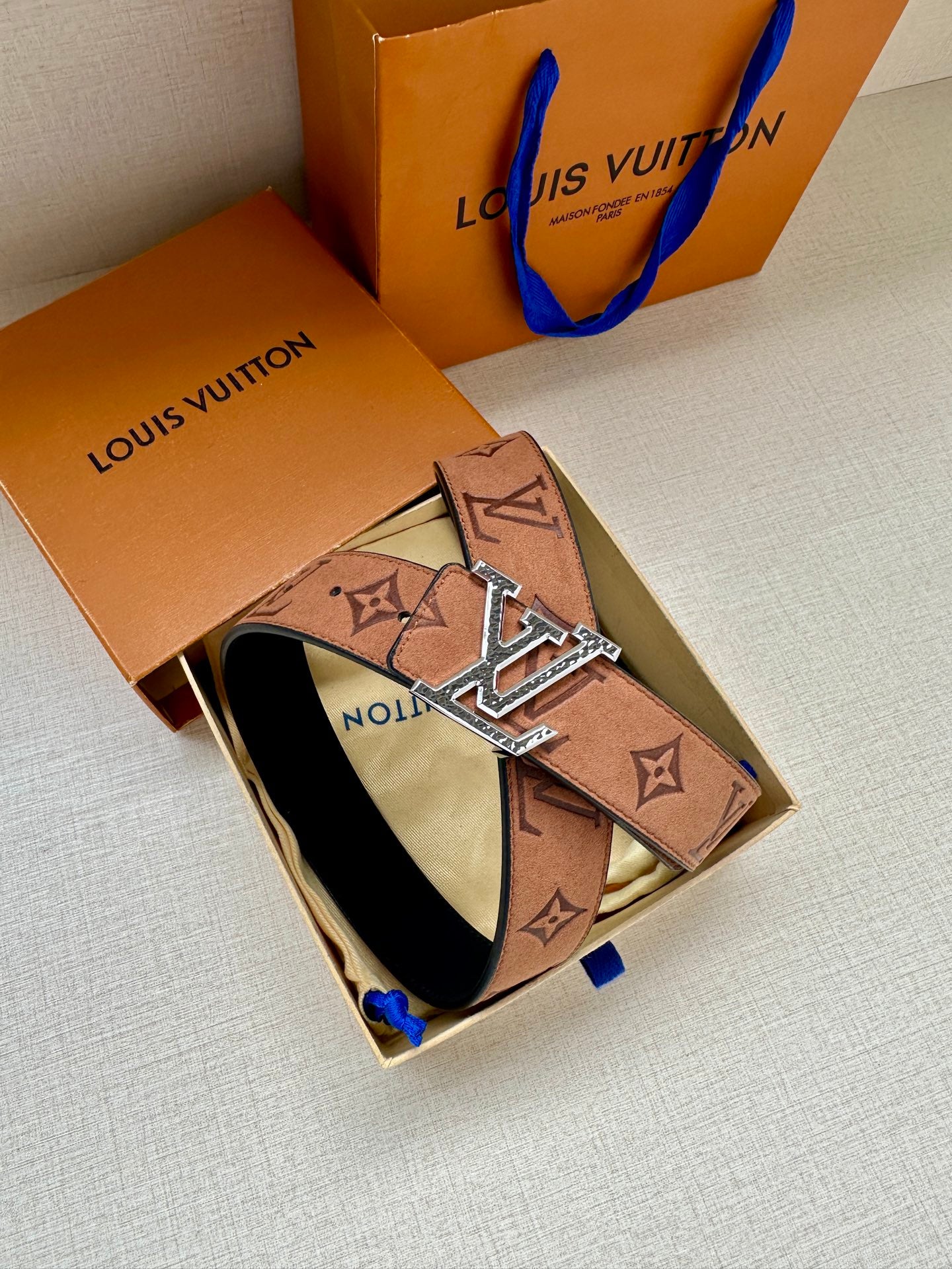 Louis Vuitton belt in gift box with monogram pattern and gold-tone LV buckle