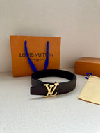 Louis Vuitton belt with dark leather strap and gold-tone LV logo buckle