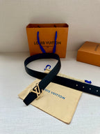 Louis Vuitton belt with dark strap and LV logo buckle with strap end and holes