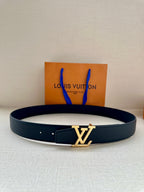 Dark blue leather belt with gold LV buckle centered on the strap.