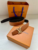 Louis Vuitton leather belt, tan strap with gold LV buckle
