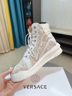 High-top lace-up sneakers in light beige with gold baroque print and chunky rubber sole