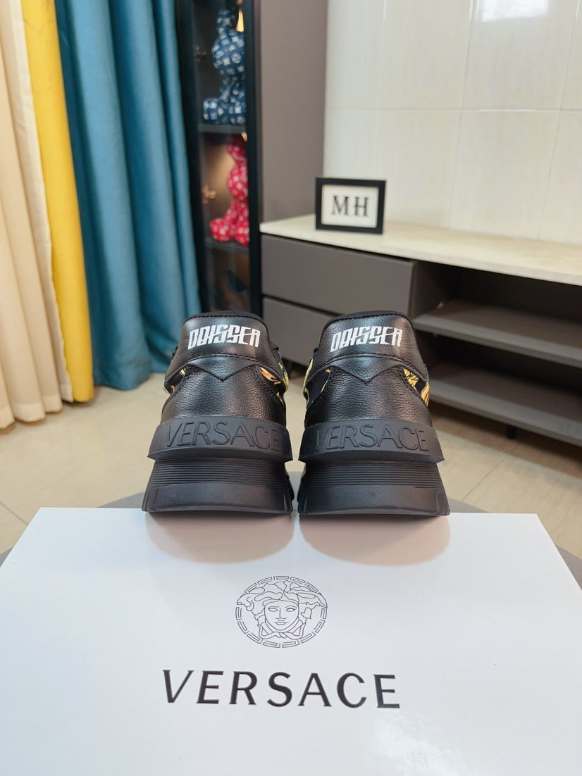 Versace platform sneakers back view, dark leather with gold baroque motifs