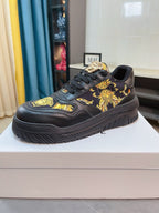 Versace platform sneakers in dark with gold lion baroque motif and lace-up front