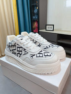 Versace white sneakers with black logo print and cushioned platform sole