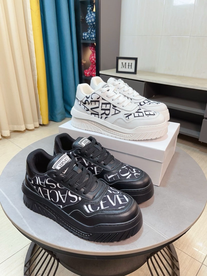 Versace sneakers, white and black colorways with bold logo print and lace-up tops