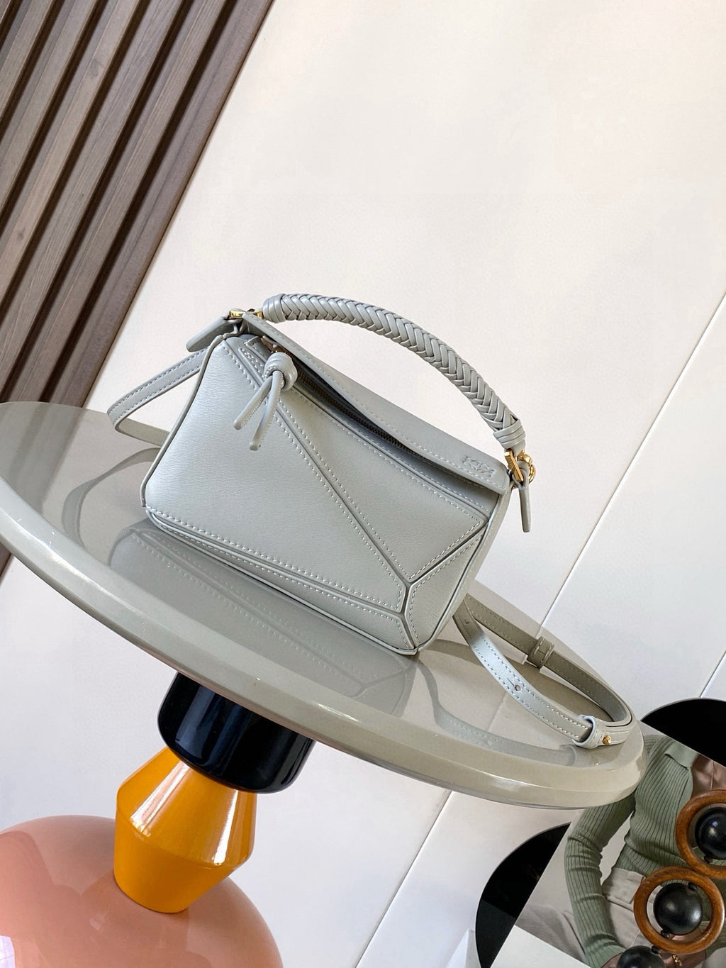 Light blue small crossbody bag with braided strap and gold clasp