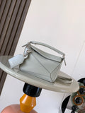 Light blue small Loewe leather shoulder bag with top handle and adjustable strap