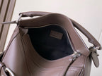 Leather bag interior with zip top closure and LOEWE patch, taupe