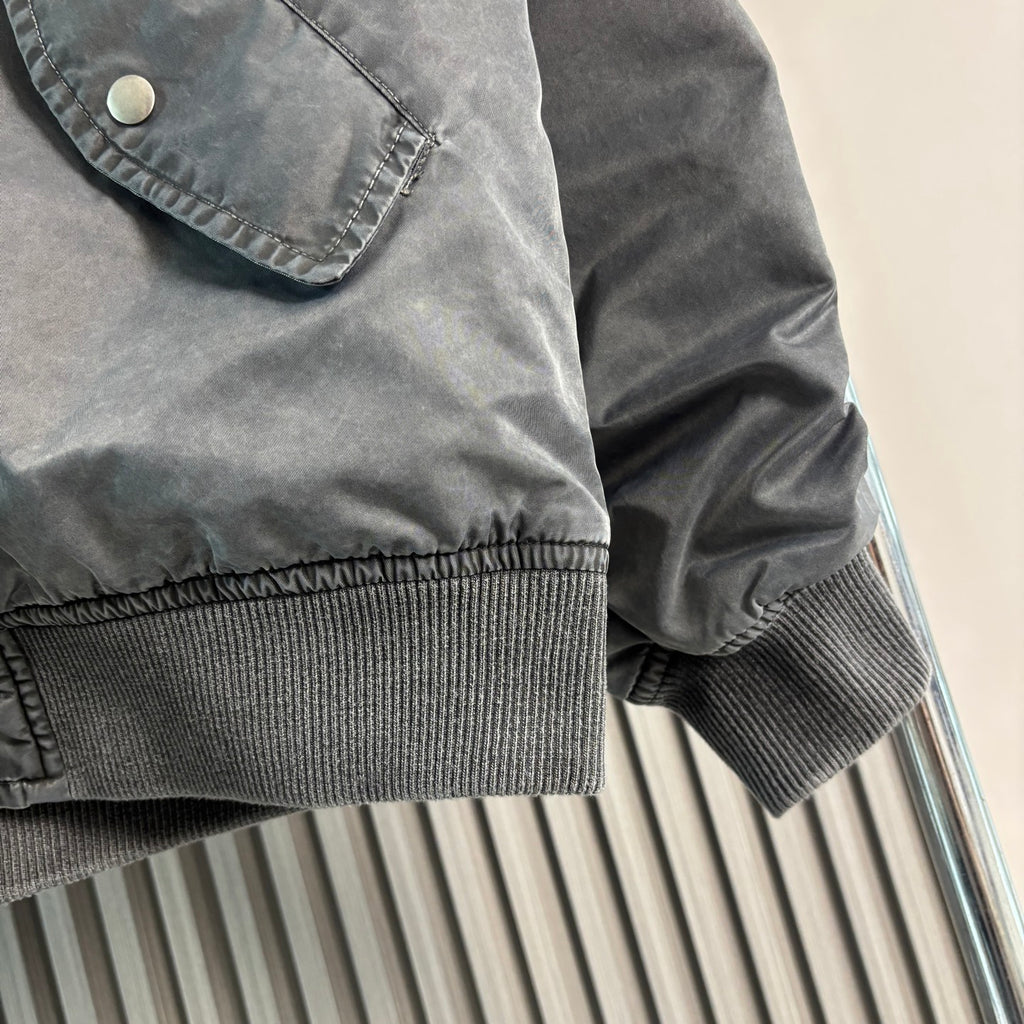 Stone Island bomber jacket hem and sleeve cuff with ribbed knit trim and snap pocket