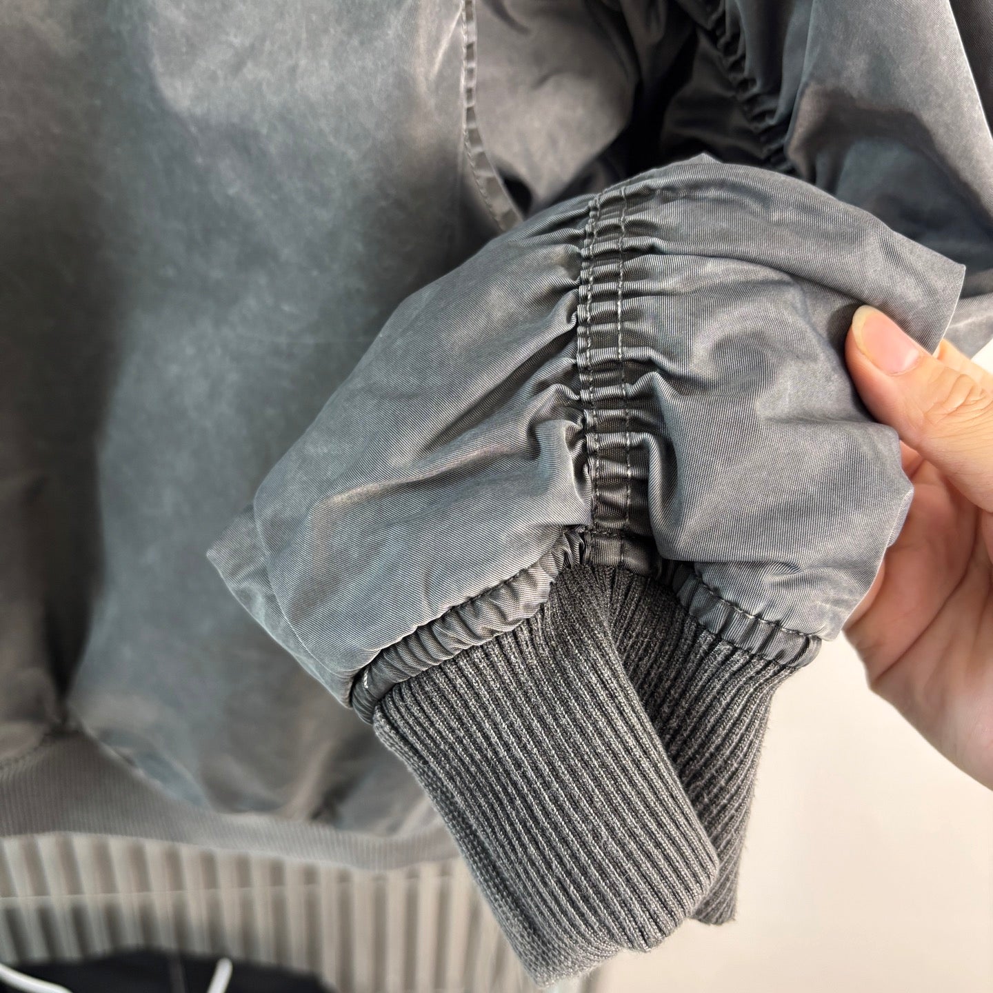 Stone Island bomber jacket sleeve cuff detail with ribbed knit cuff and zipper seam