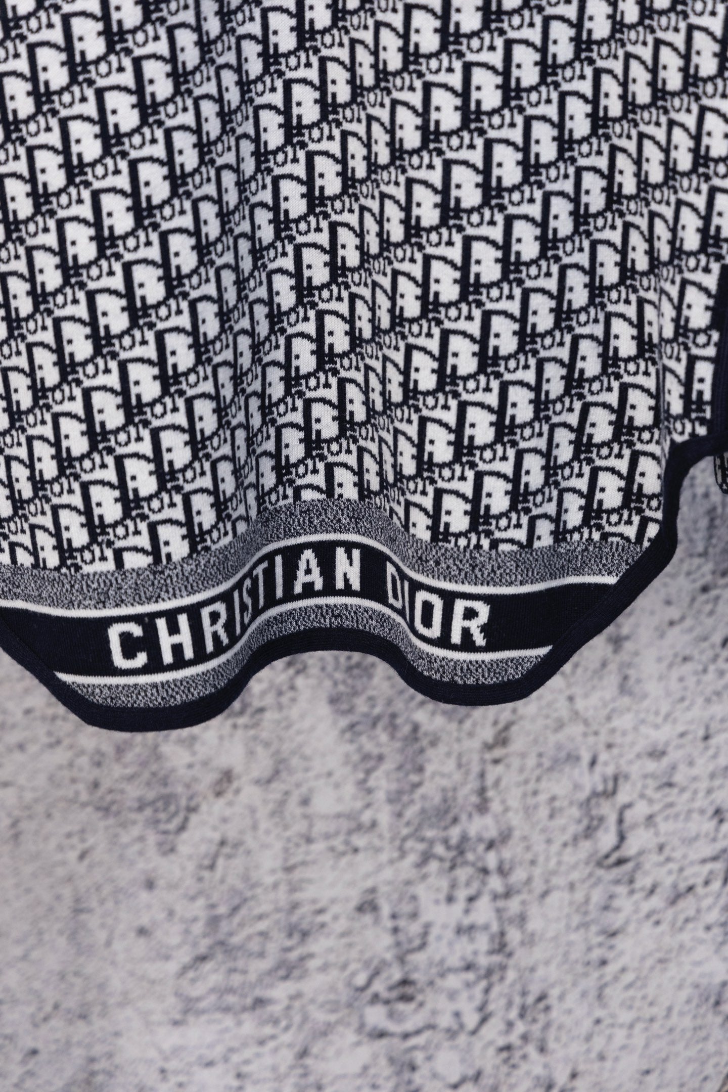 Dior hooded top featuring CHRISTIAN DIOR logo band and textured light fabric