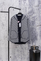 Zip-up hooded sweatshirt, black-and-white patterned knit, front zipper view