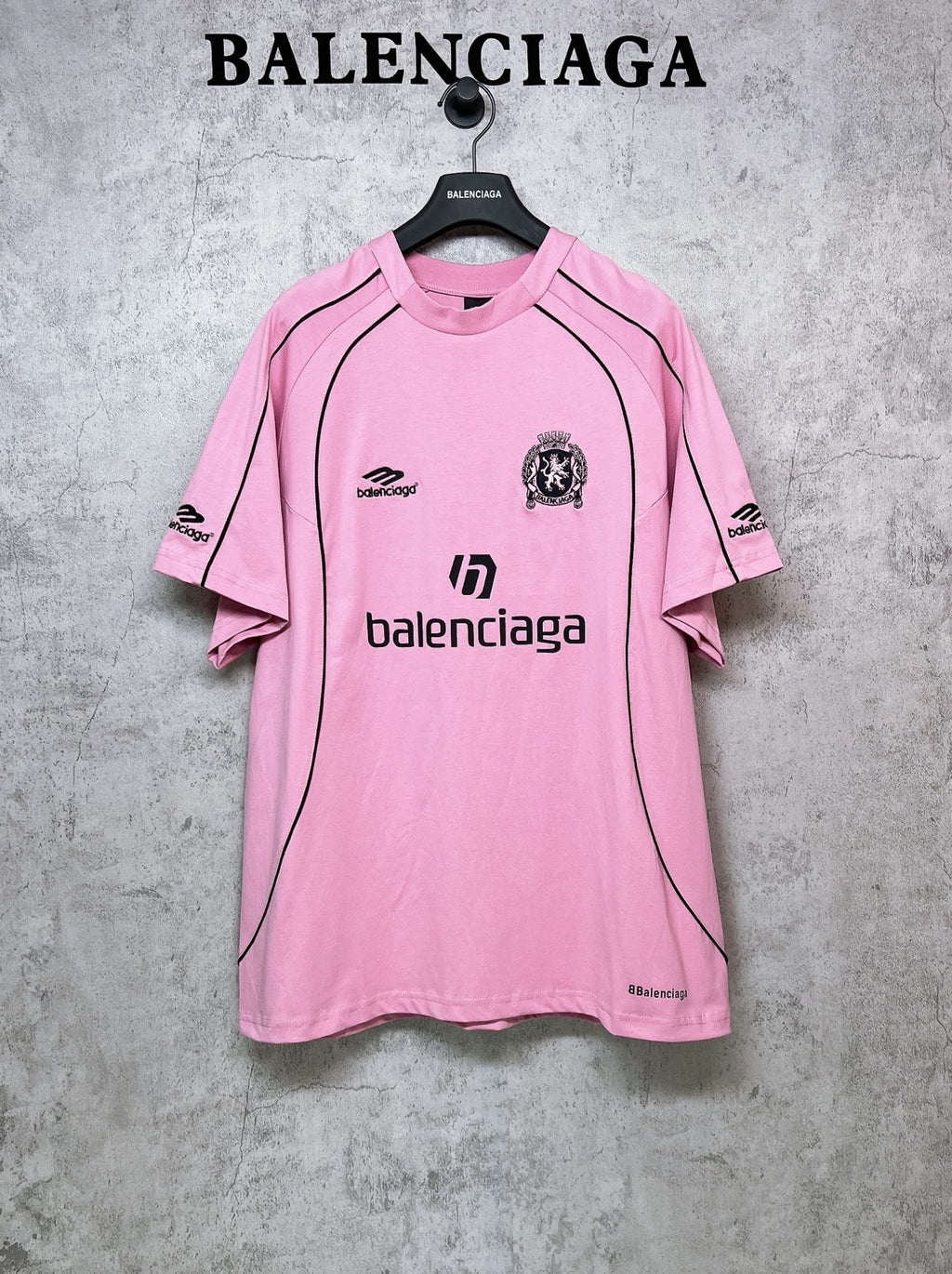 Balenciaga short-sleeve T-shirt, pink with black logo and crest on the front