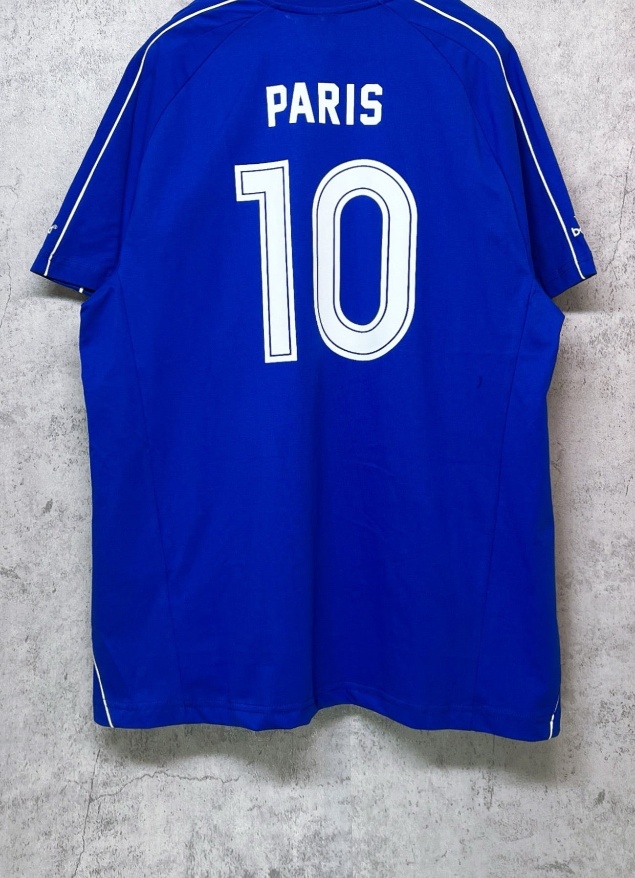 Blue short-sleeve jersey back with 'PARIS' and large number '10' print