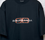 Balenciaga black short-sleeve T-shirt with orange and white logo graphic centered