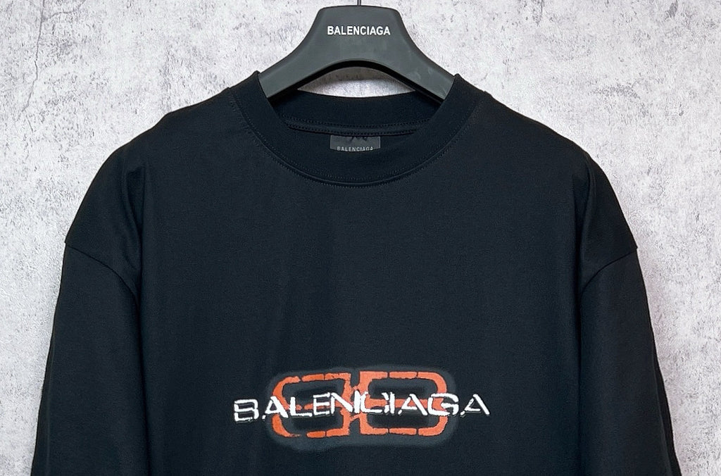 Balenciaga black short-sleeve T-shirt with orange and white chest logo