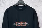 Balenciaga black short-sleeve T-shirt with orange and white chest logo