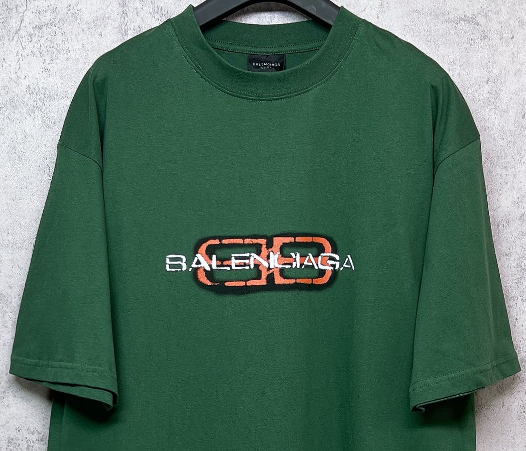 Green T-shirt with centered Balenciaga logo print, short sleeves