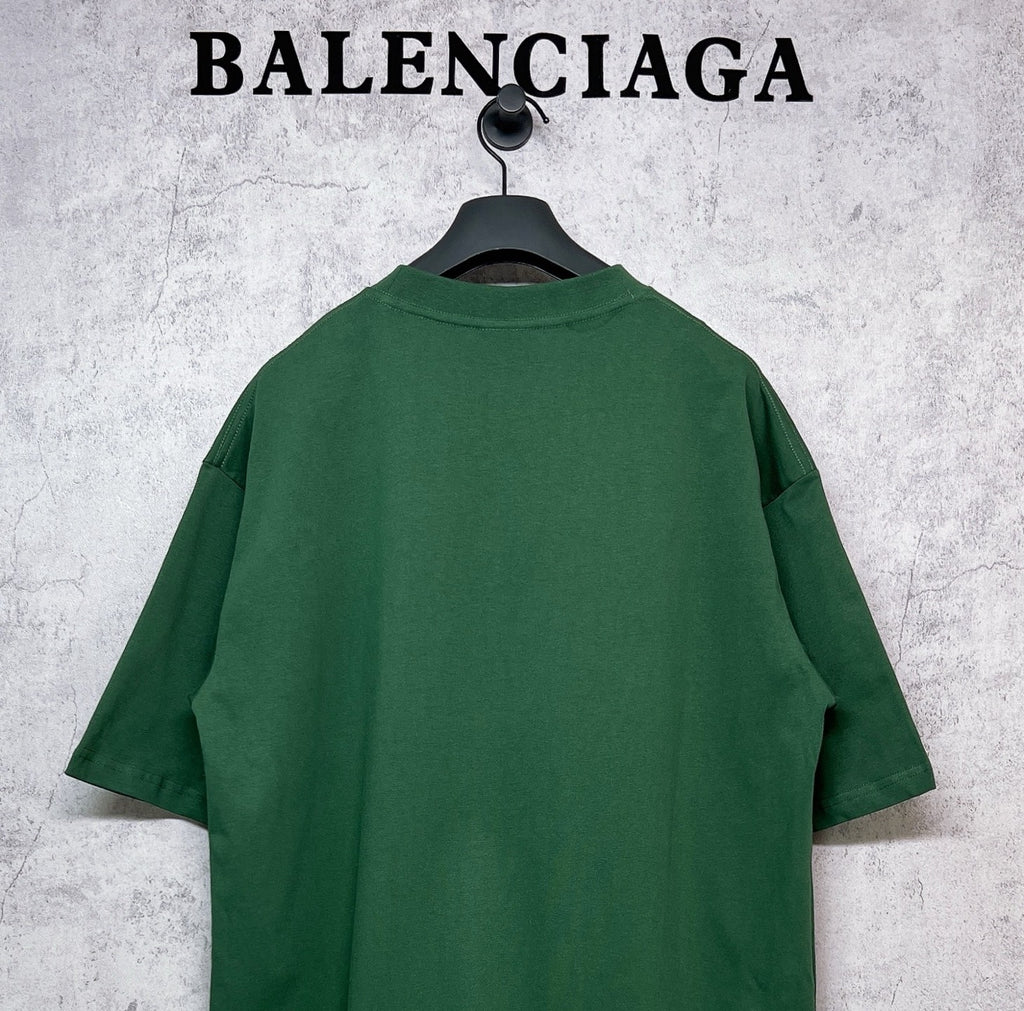 Green T-shirt back view on hanger, short sleeves