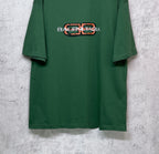 Green T-shirt lower front view with Balenciaga logo print on chest