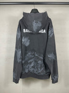 Balenciaga pullover hoodie, distressed print all over, hood up and front kangaroo pocket