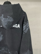 Balenciaga hoodie back with hood and distressed print, logo text partially visible
