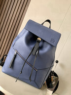 Loewe men’s blue leather backpack with front flap and drawstring ties
