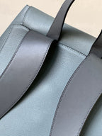 Loewe men's leather backpack interior with stitched side panels and strap tabs
