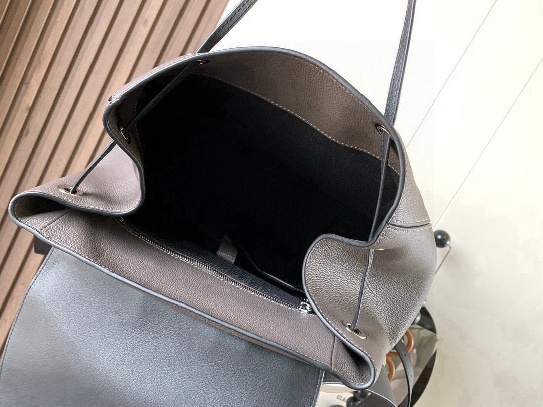 Loewe men’s bag, metallic gray, open top showing black fabric lining