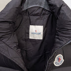 Moncler logo patch inside black puffer vest lining