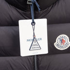 Moncler hang tag on black puffer vest zipper